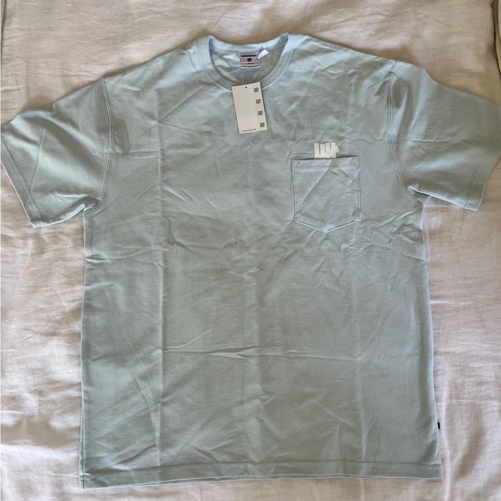 Men’s baby blue undefeated pocket t-shirt NWT